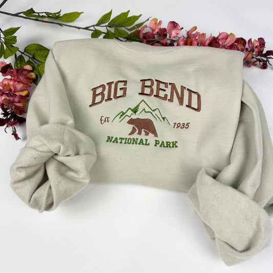 Big Bend National Park embroidered cream crewneck sweatshirt with natural design elements.