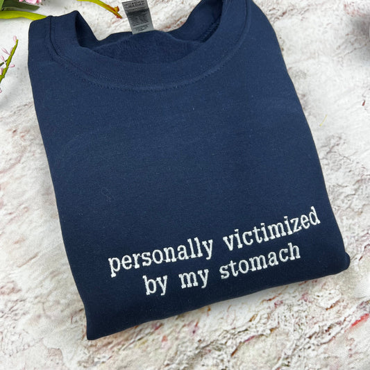Personally Victimized by my Stomach Embroidered Sweatshirt