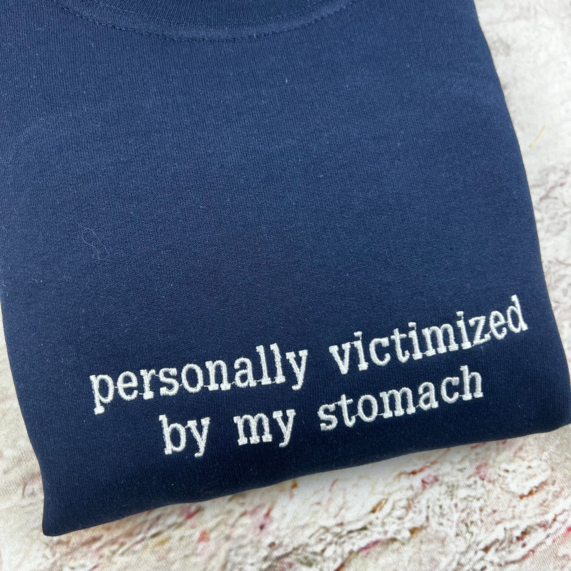 Personally Victimized by my Stomach Embroidered Sweatshirt