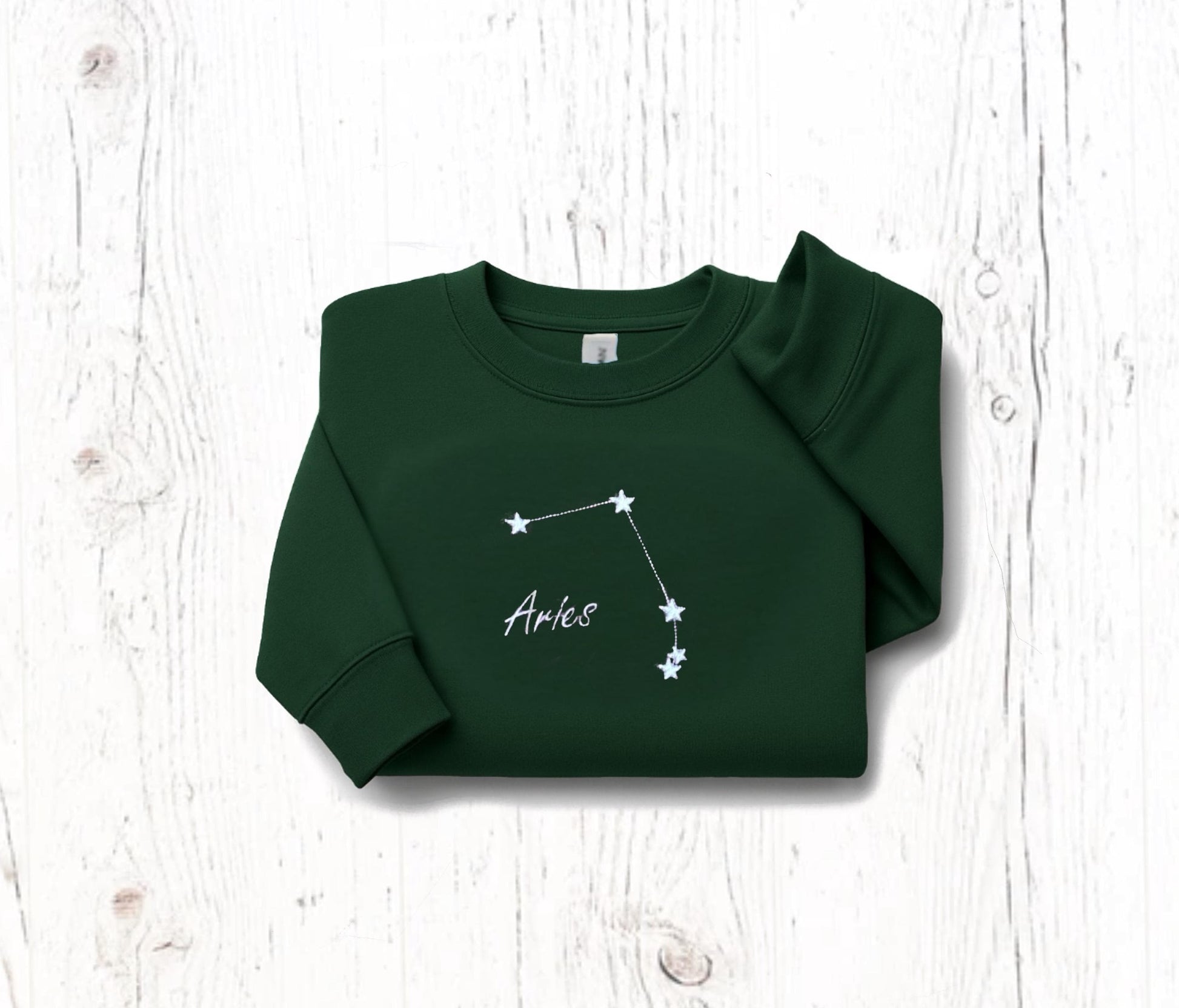 Custom Zodiac Constellation Embroidered Sweatshirt in green with Aries star sign design.